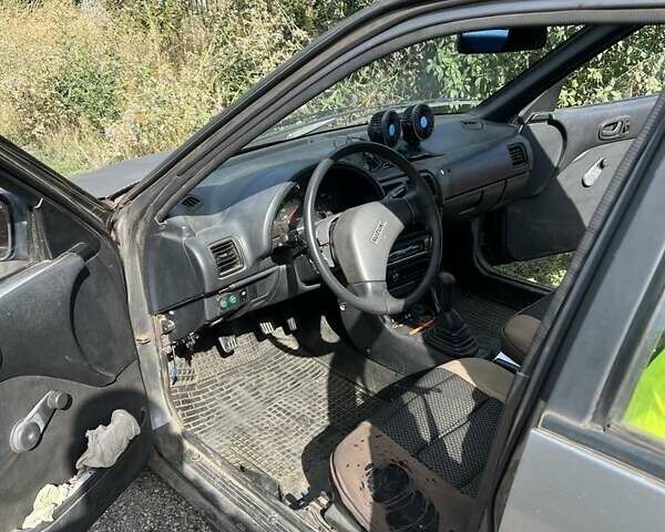 Сірий Сузукі Свифт, об'ємом двигуна 1.3 л та пробігом 220 тис. км за 680 $, фото 1 на Automoto.ua