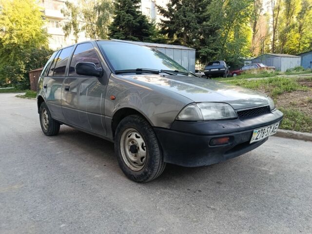 Серый Сузуки Свифт, объемом двигателя 1.3 л и пробегом 123 тыс. км за 751 $, фото 1 на Automoto.ua