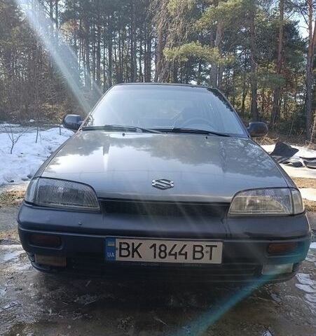 Серый Сузуки Свифт, объемом двигателя 0.99 л и пробегом 235 тыс. км за 1350 $, фото 1 на Automoto.ua