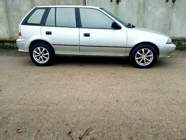 Серый Сузуки Свифт, объемом двигателя 1.3 л и пробегом 196 тыс. км за 1900 $, фото 1 на Automoto.ua