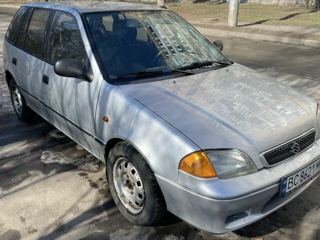 Серый Сузуки Свифт, объемом двигателя 1.3 л и пробегом 260 тыс. км за 1700 $, фото 1 на Automoto.ua