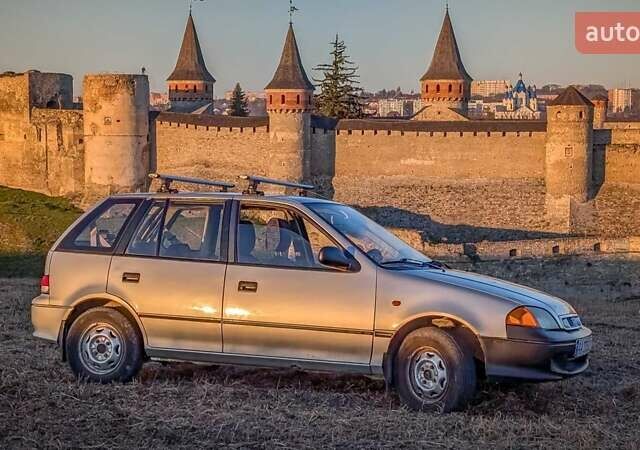 Серый Сузуки Свифт, объемом двигателя 1.3 л и пробегом 233 тыс. км за 1750 $, фото 1 на Automoto.ua
