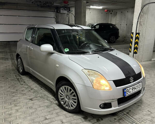 Серый Сузуки Свифт, объемом двигателя 1.49 л и пробегом 163 тыс. км за 5400 $, фото 1 на Automoto.ua