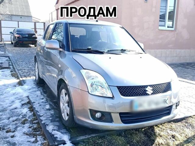Сірий Сузукі Свифт, об'ємом двигуна 1 л та пробігом 150 тис. км за 4100 $, фото 1 на Automoto.ua