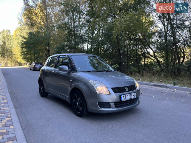 Сірий Сузукі Свифт, об'ємом двигуна 1.3 л та пробігом 189 тис. км за 4900 $, фото 1 на Automoto.ua