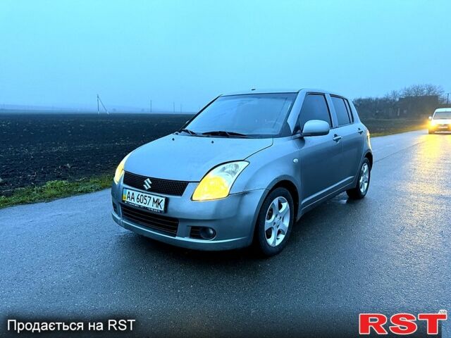 Серый Сузуки Свифт, объемом двигателя 1.3 л и пробегом 100 тыс. км за 3550 $, фото 1 на Automoto.ua