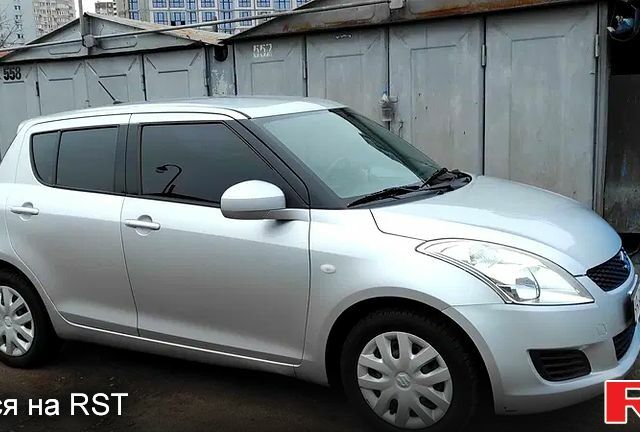Сірий Сузукі Свифт, об'ємом двигуна 1.2 л та пробігом 166 тис. км за 5900 $, фото 1 на Automoto.ua