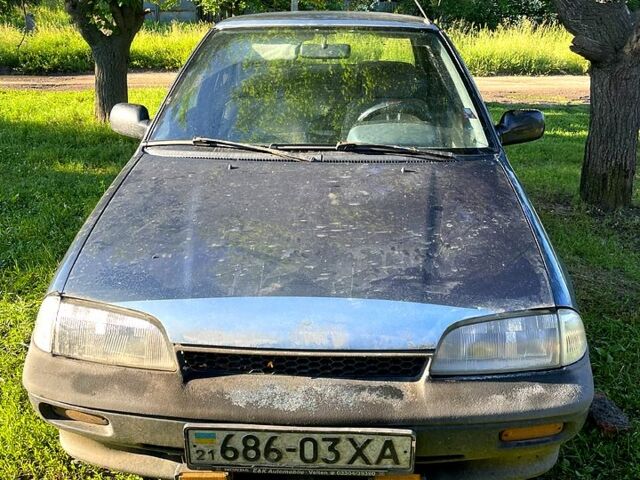 Сірий Сузукі Свифт, об'ємом двигуна 1.3 л та пробігом 0 тис. км за 670 $, фото 1 на Automoto.ua
