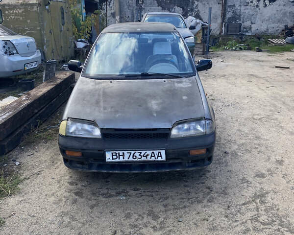 Сузукі Свифт 1994 у Вознесенске на Automoto.ua Сірий Сузукі Свифт, об'ємом двигуна 1.6 л та пробігом 253 тис. км за 500 $, фото 1 на Automoto.ua