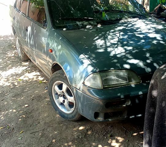 Сірий Сузукі Свифт, об'ємом двигуна 1.3 л та пробігом 200 тис. км за 380 $, фото 1 на Automoto.ua