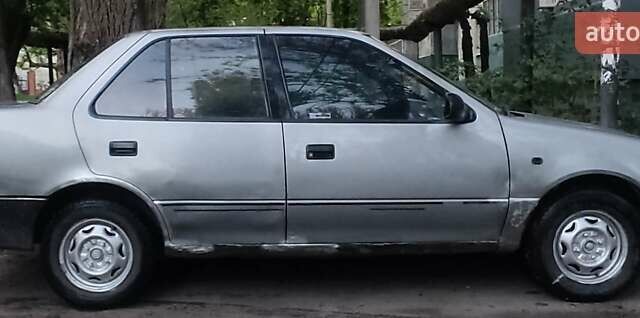 Сірий Сузукі Свифт, об'ємом двигуна 1.3 л та пробігом 150 тис. км за 570 $, фото 1 на Automoto.ua