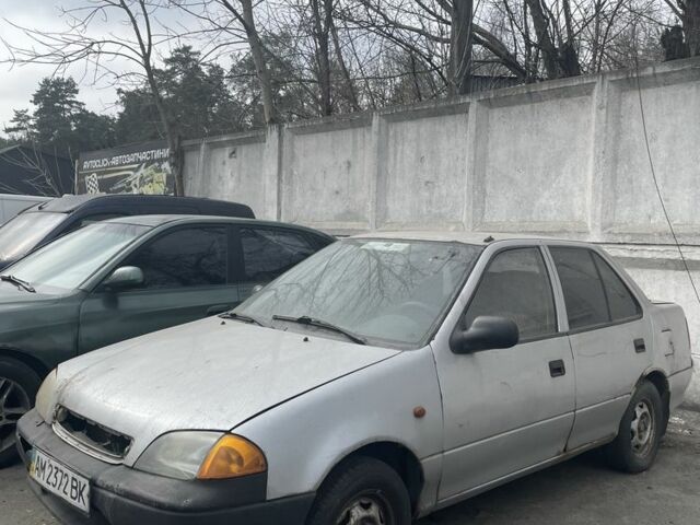 Серый Сузуки Свифт, объемом двигателя 1.3 л и пробегом 222 тыс. км за 550 $, фото 1 на Automoto.ua