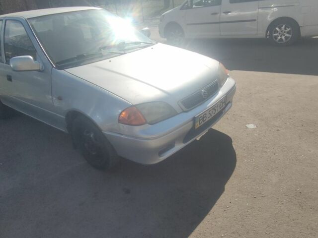 Сірий Сузукі Свифт, об'ємом двигуна 1.3 л та пробігом 230 тис. км за 1000 $, фото 1 на Automoto.ua