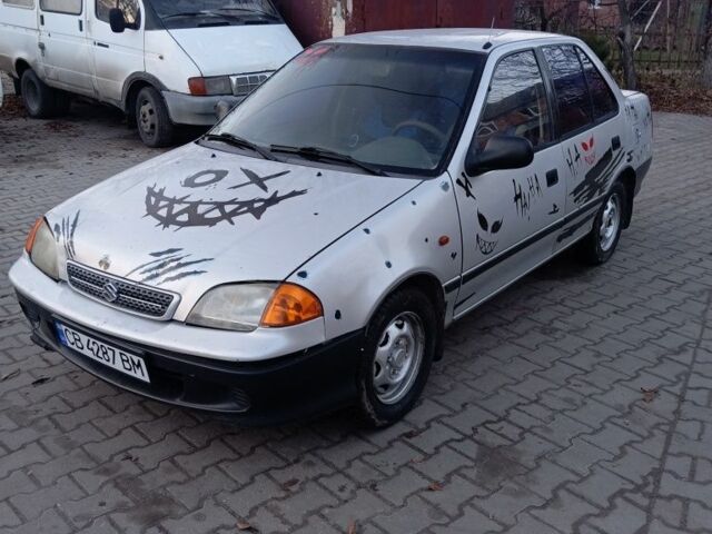 Серый Сузуки Свифт, объемом двигателя 1.3 л и пробегом 111 тыс. км за 1300 $, фото 1 на Automoto.ua