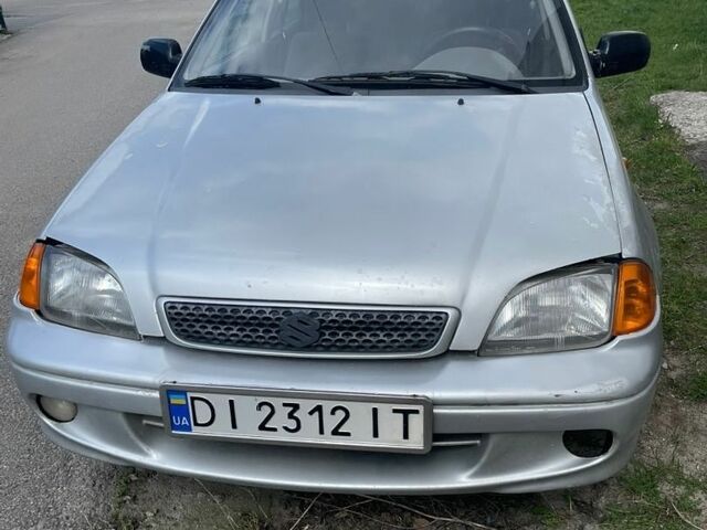 Сірий Сузукі Свифт, об'ємом двигуна 1.3 л та пробігом 354 тис. км за 1000 $, фото 1 на Automoto.ua