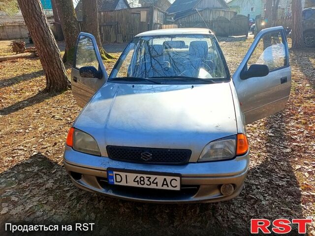 Серый Сузуки Свифт, объемом двигателя 1.3 л и пробегом 160 тыс. км за 1500 $, фото 1 на Automoto.ua
