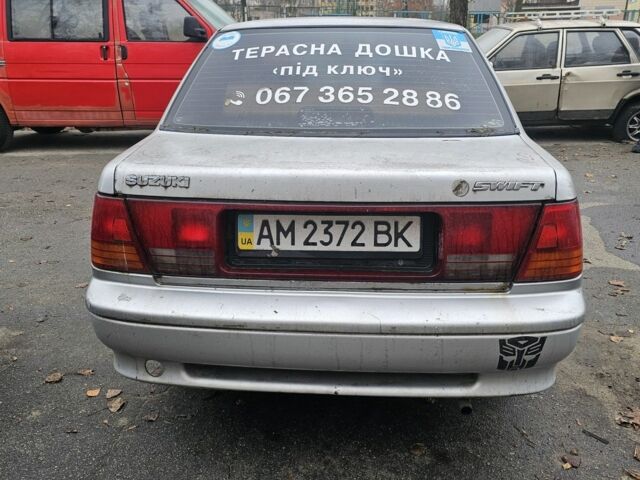 Серый Сузуки Свифт, объемом двигателя 1.3 л и пробегом 234 тыс. км за 550 $, фото 1 на Automoto.ua