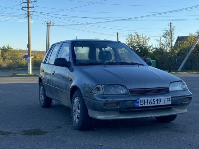 Серый Сузуки Свифт, объемом двигателя 1 л и пробегом 24 тыс. км за 900 $, фото 1 на Automoto.ua