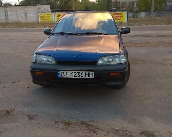 Синий Сузуки Свифт, объемом двигателя 1 л и пробегом 470 тыс. км за 1550 $, фото 1 на Automoto.ua