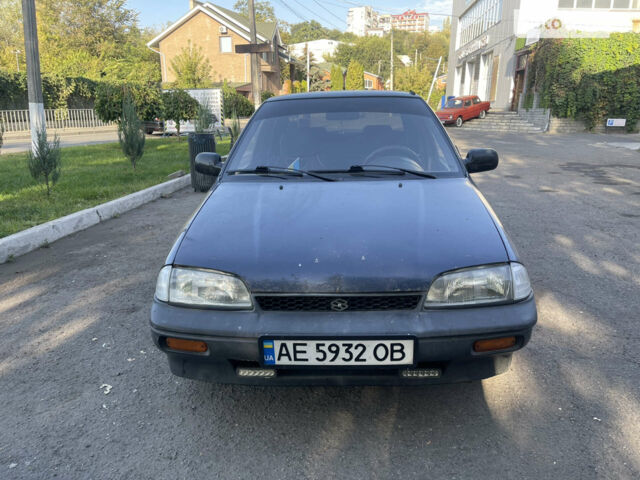 Синій Сузукі Свифт, об'ємом двигуна 1.3 л та пробігом 255 тис. км за 1100 $, фото 1 на Automoto.ua