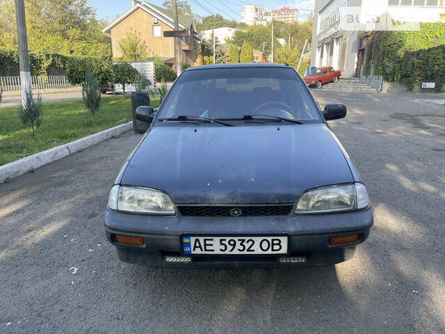 Синий Сузуки Свифт, объемом двигателя 1.3 л и пробегом 255 тыс. км за 1100 $, фото 1 на Automoto.ua