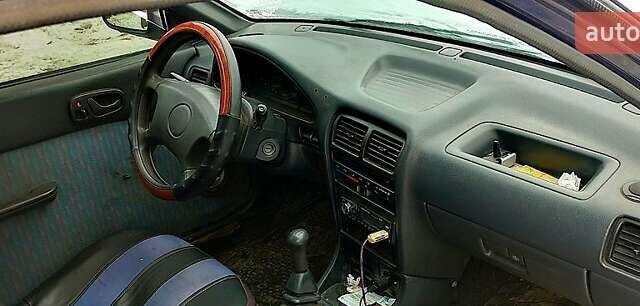 Синий Сузуки Свифт, объемом двигателя 1.3 л и пробегом 33 тыс. км за 1300 $, фото 1 на Automoto.ua