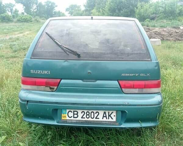 Зелений Сузукі Свифт, об'ємом двигуна 1 л та пробігом 400 тис. км за 700 $, фото 1 на Automoto.ua