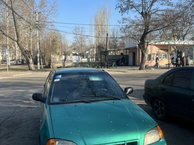 Зелений Сузукі Свифт, об'ємом двигуна 1 л та пробігом 3 тис. км за 1000 $, фото 1 на Automoto.ua