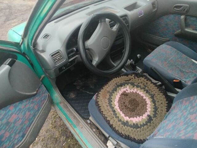 Зелений Сузукі Свифт, об'ємом двигуна 1.3 л та пробігом 202 тис. км за 900 $, фото 1 на Automoto.ua