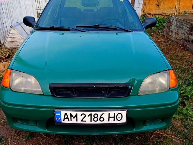 Зелений Сузукі Свифт, об'ємом двигуна 1.3 л та пробігом 90 тис. км за 1100 $, фото 1 на Automoto.ua