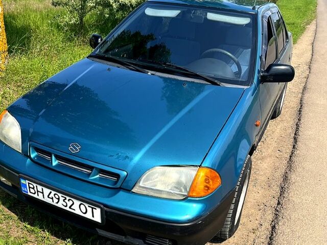 Зелений Сузукі Свифт, об'ємом двигуна 1.3 л та пробігом 137 тис. км за 1500 $, фото 1 на Automoto.ua