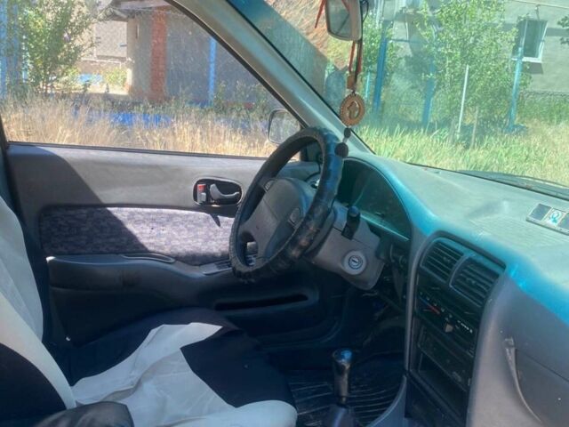 Зелений Сузукі Свифт, об'ємом двигуна 1.3 л та пробігом 333 тис. км за 1600 $, фото 1 на Automoto.ua