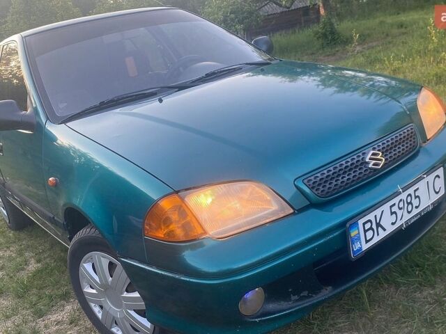Зелений Сузукі Свифт, об'ємом двигуна 1.3 л та пробігом 200 тис. км за 1650 $, фото 1 на Automoto.ua