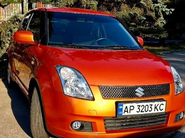 Помаранчевий Сузукі Свифт, об'ємом двигуна 1.49 л та пробігом 270 тис. км за 5400 $, фото 1 на Automoto.ua