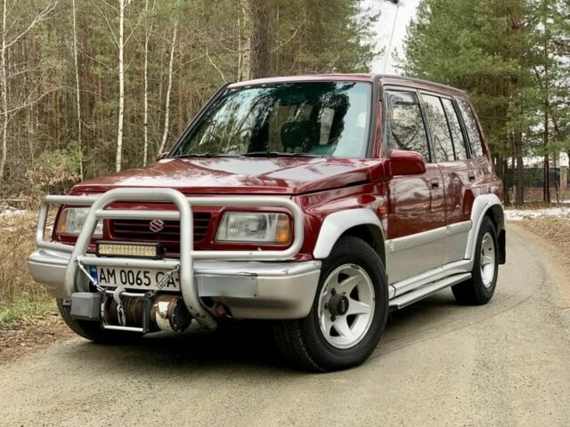 Красный Сузуки Витара, объемом двигателя 1.6 л и пробегом 91 тыс. км за 4500 $, фото 1 на Automoto.ua