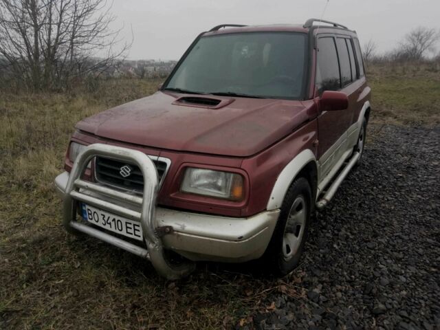 Красный Сузуки Витара, объемом двигателя 2 л и пробегом 350 тыс. км за 4500 $, фото 1 на Automoto.ua