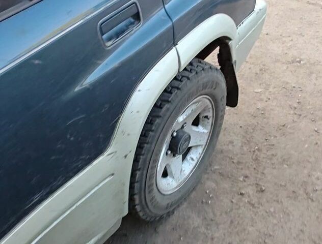 Зеленый Сузуки Витара, объемом двигателя 2 л и пробегом 284 тыс. км за 999 $, фото 1 на Automoto.ua