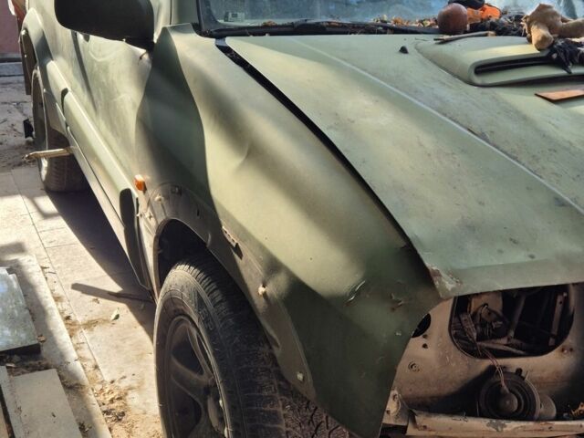 Зеленый Сузуки Витара, объемом двигателя 2 л и пробегом 300 тыс. км за 1500 $, фото 1 на Automoto.ua