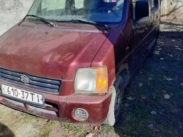 Красный Сузуки Вагон Р, объемом двигателя 1 л и пробегом 221 тыс. км за 650 $, фото 1 на Automoto.ua