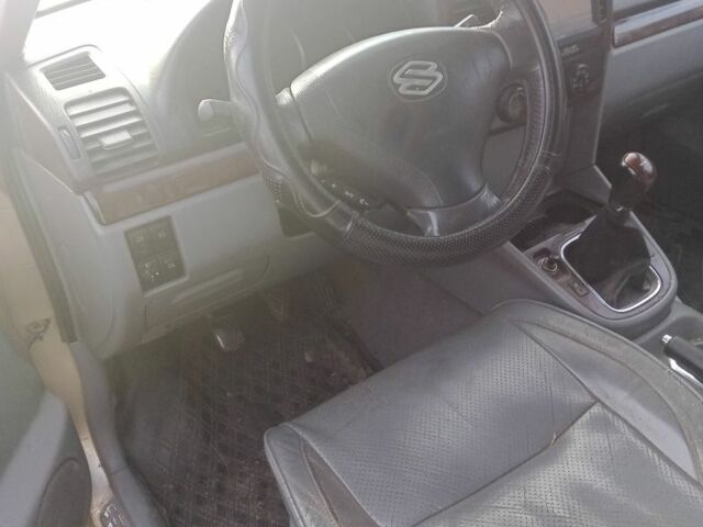 Серый Сузуки ХЛ7, объемом двигателя 2 л и пробегом 300 тыс. км за 2600 $, фото 1 на Automoto.ua