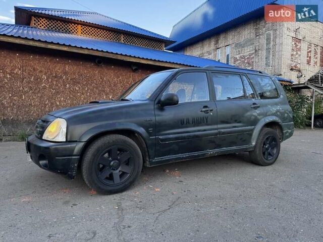 Зелений Сузукі Grand Vitara XL7, об'ємом двигуна 2 л та пробігом 310 тис. км за 4326 $, фото 1 на Automoto.ua