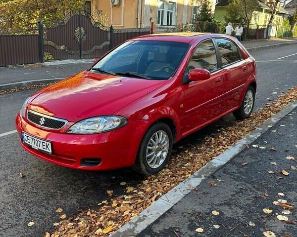 Красный Сузуки Reno, объемом двигателя 2 л и пробегом 183 тыс. км за 4000 $, фото 1 на Automoto.ua