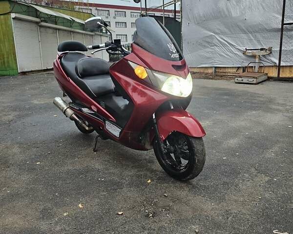 Красный Сузуки Skywave 250, объемом двигателя 0.25 л и пробегом 29 тыс. км за 1800 $, фото 1 на Automoto.ua