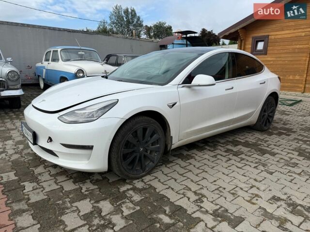 Белый Тесла Модель 3, объемом двигателя 0 л и пробегом 165 тыс. км за 12500 $, фото 1 на Automoto.ua