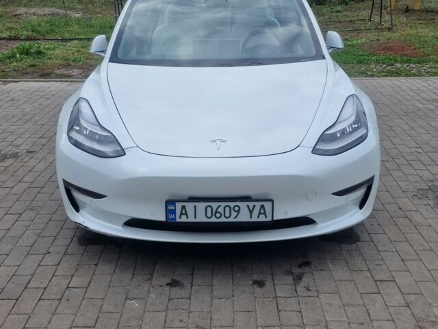 Белый Тесла Модель 3, объемом двигателя 0 л и пробегом 124 тыс. км за 15000 $, фото 1 на Automoto.ua