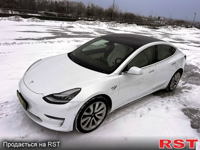 Білий Тесла Модель 3, об'ємом двигуна 0.18 л та пробігом 170 тис. км за 13900 $, фото 1 на Automoto.ua