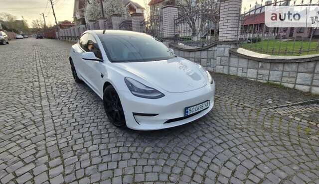 Белый Тесла Модель 3, объемом двигателя 0 л и пробегом 75 тыс. км за 25799 $, фото 1 на Automoto.ua
