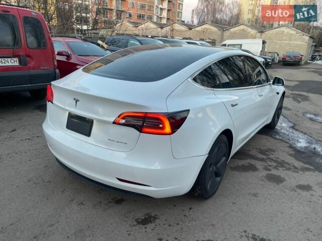 Белый Тесла Модель 3, объемом двигателя 0 л и пробегом 160 тыс. км за 11500 $, фото 1 на Automoto.ua