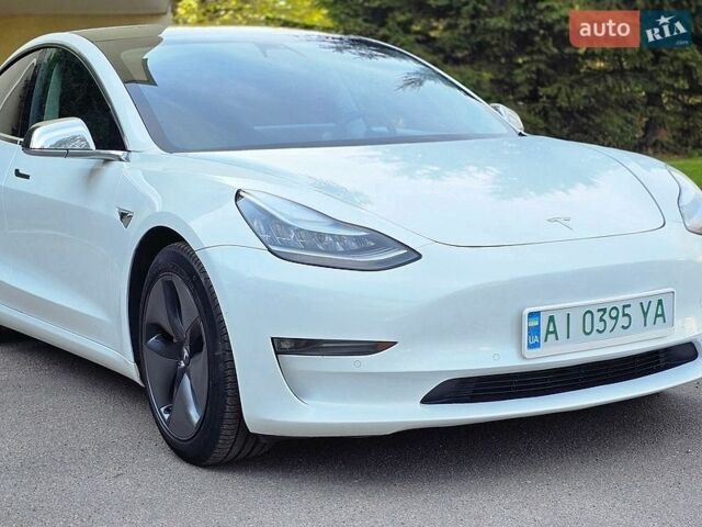 Білий Тесла Модель 3, об'ємом двигуна 0 л та пробігом 125 тис. км за 19300 $, фото 1 на Automoto.ua