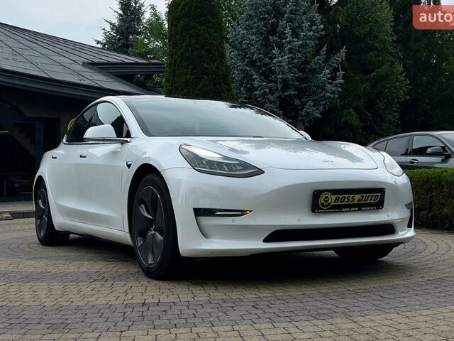 Білий Тесла Модель 3, об'ємом двигуна 0 л та пробігом 123 тис. км за 17500 $, фото 1 на Automoto.ua